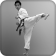 Image of a man doing a side kick.